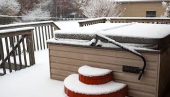 An outdoor hot tub closed for the winter